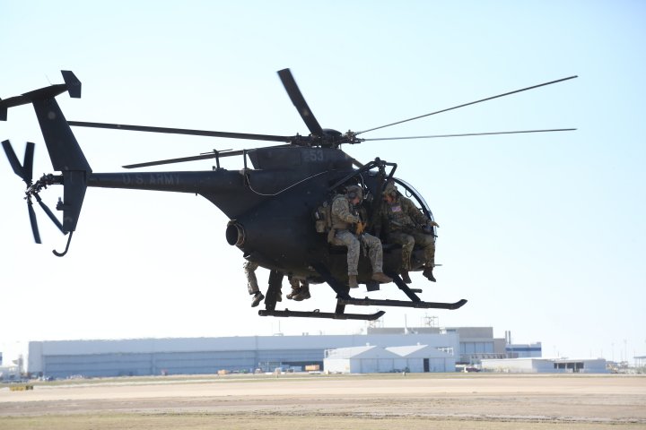 Operators from US Army’s 10th Special Forces Group conduct aviation insertion training with an AH-6 Little Bird at Fort Carson, Colorado. 