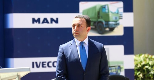 The Georgian Minister of Defence, Irakli Gharibashvili, has signed an agreement to buy new trucks for the country's military as part of efforts to upgrade its equipment and improve NATO interoperability.
