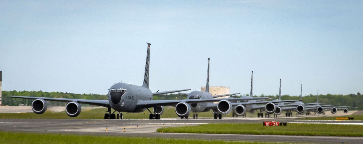 Six KC-135s taxi at Joint Base McGuire-Dix-Lakehurst, New Jersey, on 11 May 2019. The KC-135 leads the US Air Force in fixed-wing aircraft depot maintenance speed at finishing 27.7 days ahead of schedule. (US Air National Guard)