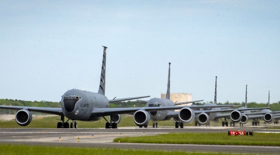 Six KC-135s taxi at Joint Base McGuire-Dix-Lakehurst, New Jersey, on 11 May 2019. The KC-135 leads the US Air Force in fixed-wing aircraft depot maintenance speed at finishing 27.7 days ahead of schedule.