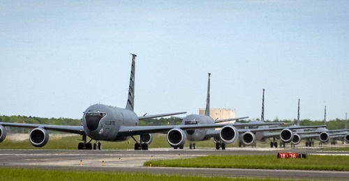 Six KC-135s taxi at Joint Base McGuire-Dix-Lakehurst, New Jersey, on 11 May 2019. The KC-135 leads the US Air Force in fixed-wing aircraft depot maintenance speed at finishing 27.7 days ahead of schedule.