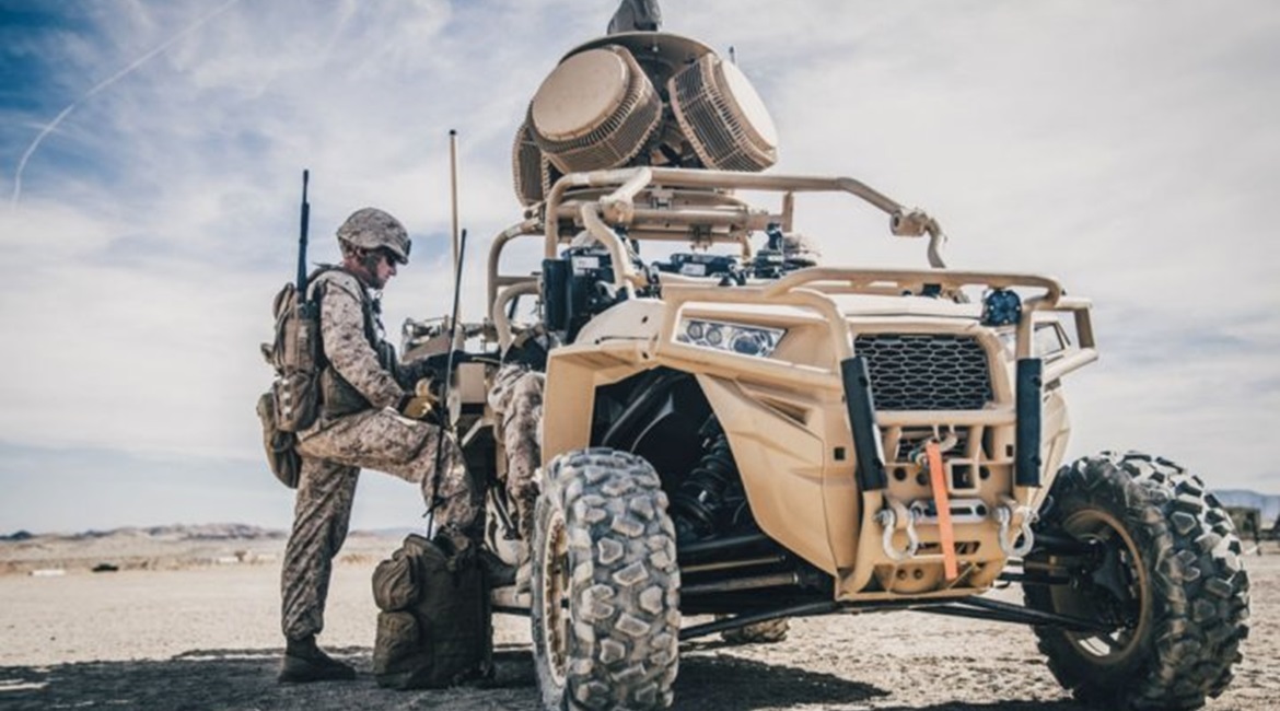 1st Lieutenant Taylor Barefoot programs a C-UAS on a Light Marine Air Defense Integrated System (LMADIS) during a predeployment training exercise at Marine Corps Air Ground Combat Center Twentynine Palms, California in 2018. This system, and future ver...