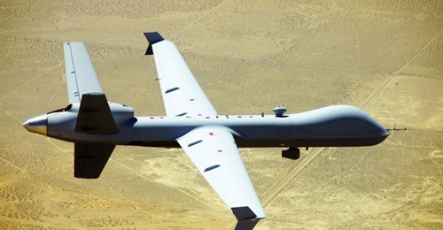 A General Atomics Aeronautical Systems Inc (GA-ASI) MQ-9 Reaper Block 5 UAV flies near the company's Gray Butte Flight Operations Center in Palmdale, California, in 2014. The company has developed and demonstrated expanded automatic take-off and landin...