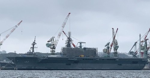 JMSDF helicopter carrier JS 
        
         is seen here on 30 June undergoing a refit at the JMU Corporation's Isogo shipyard in Yokohama City. The JMSDF has begun the process of converting 
        
         into an aircraft carrier capab...