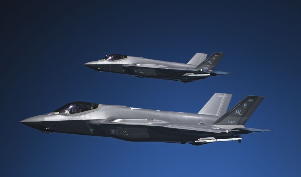 A pair of F-35As fly in formation on 15 May 2019. The Mitchell Institute for Aerospace Studies argues in a new report that the USAF adopting a cost-per-effect metric for assessing weapon systems would better analyse weapon system value than traditional metrics such as unit price.  (US Air Force)
