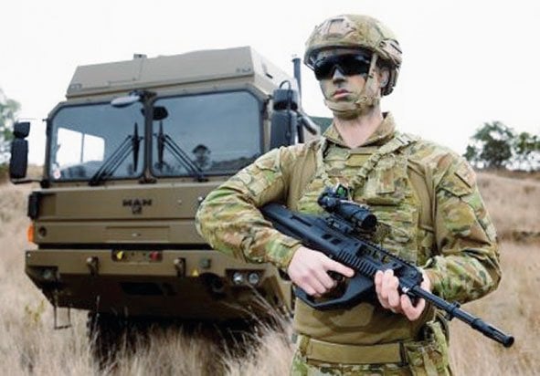 An Australian soldier carrying an EF88 Austeyr 5.56 mm rifle. Canberra announced on 13 July that it will procure 8,500 additional units of this weapon for the ADF. (Australian Army)