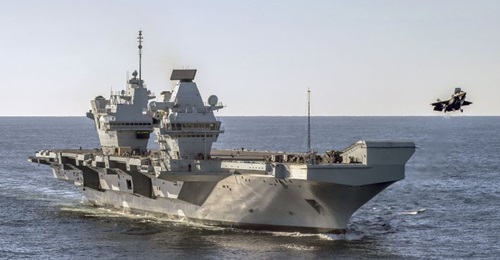 An F-35B launching from HMS 
        
        . In addition to its complement of manned aircraft, the carrier and its HMS 
        
         sister-ship are set to employ swarming drones and unmanned 'loyal wingman' depending on the results of...