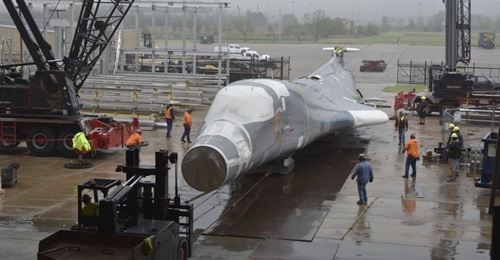 A B-1B being disassembled for virtual modelling by Wichita State University's National Institute for Aviation Research. The aircraft's tail number is 85-0092.