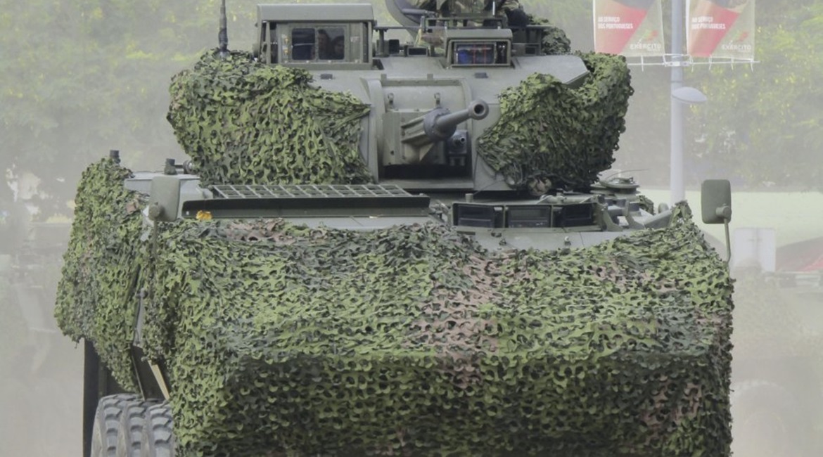 A Portuguese Pandur II IFV is shown with an SP30 two-man turret armed with a 30 mm MK30-2 cannon and two 7.62 mm MAG58 weapons.