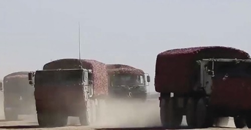 A screengrab from CCTV 7 video footage released on 28 July showing new heavy-duty trucks (the two vehicles in the foreground) that have entered service with the PLA's Tibet Military District.