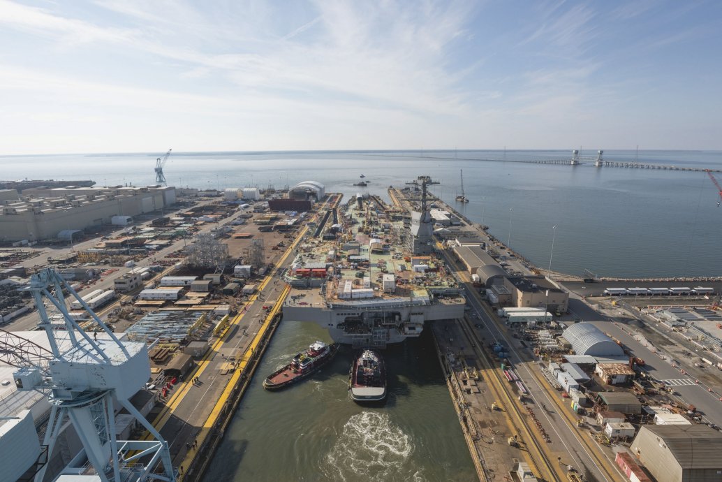 Following a fire on 20 July, hotwork was halted on aircraft carrier John F. Kennedy, which was launched in December from a dry dock in Newport News Shipbuilding. (Huntington Ingalls Industries)