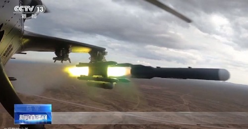 A screengrab from CCTV 13 footage showing what appears to be a new ASM being fired from a Chinese Z-10 attack helicopter at an undisclosed location.