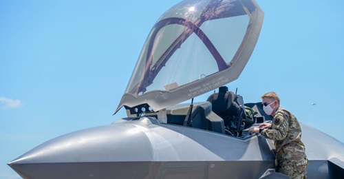 A member of the Columbus Air Force Base Fire Department inspects the interior of an F-35A on 7 August 2020 at Columbus AFB in Mississippi. The Pentagon potentially overpaid USD10.6 million in performance-incentive fees by not independently collecting a...