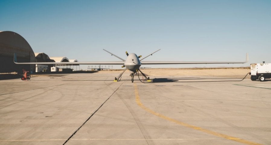 A General Atomics MQ-9B Reaper unmanned aerial vehicle staged at the US Army Yuma Proving Grounds on 7 November 2019. USMC engineers are developing a Fused Integrated Naval Network (FINN) pod prototype to be integrated on to the MQ-9B. (US Marine Corps )