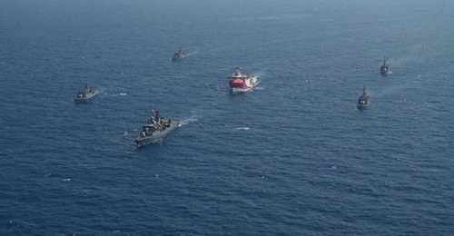 The Turkish survey vessel Oruç Reis is pictured being escorted by Turkish Navy vessels in the eastern Mediterranean on 10 August.