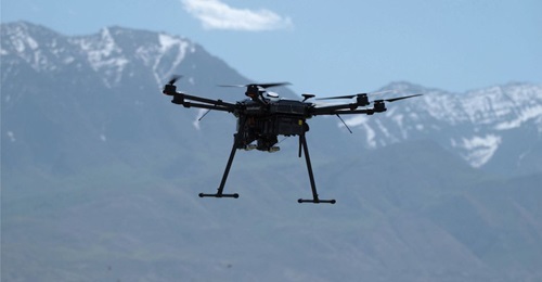 The SkyDome system includes DroneHunter, a multirotor UAS that intercepts rogue UASs with a net tether