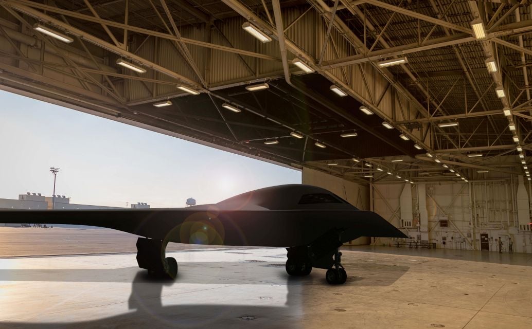 Artist’s rendering of a B-21 concept in a hangar at Whiteman Air Force Base in Missouri. The USAF has delayed the first flight of its B-21 to no earlier than 2022 after previously targeting late 2021. (Northrop Grumman)