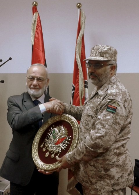 Adnan Tanriverdi (left) in Tripoli in 2013, when Sadat said it was assessing the requirements of Libya's armed forces. Tanriverdi told Anadolu Agency in 2016 that his company had yet to secure a foreign contract.