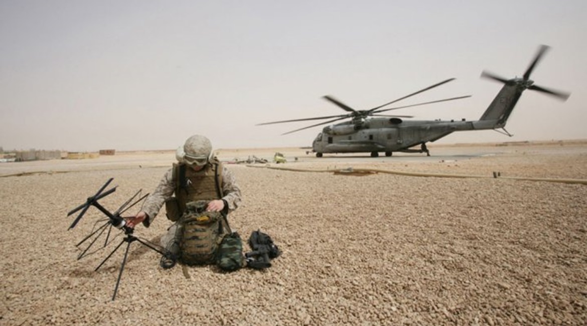 A US Marine Corps field radio operator from the 26th Marine Expeditionary Unit sets up satellite communication at Camp Korean Village, Iraq in 2008. The Pentagon's Space Development Agency awarded contracts for the National Defense Space Architecture's...