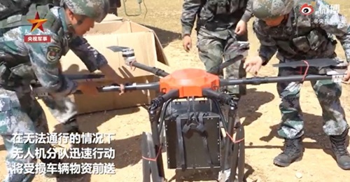 A screengrab from CCTV footage released on 10 September showing one of the six-rotor UAVs operated by the PLA's Tibet Military District being prepared for take-off.