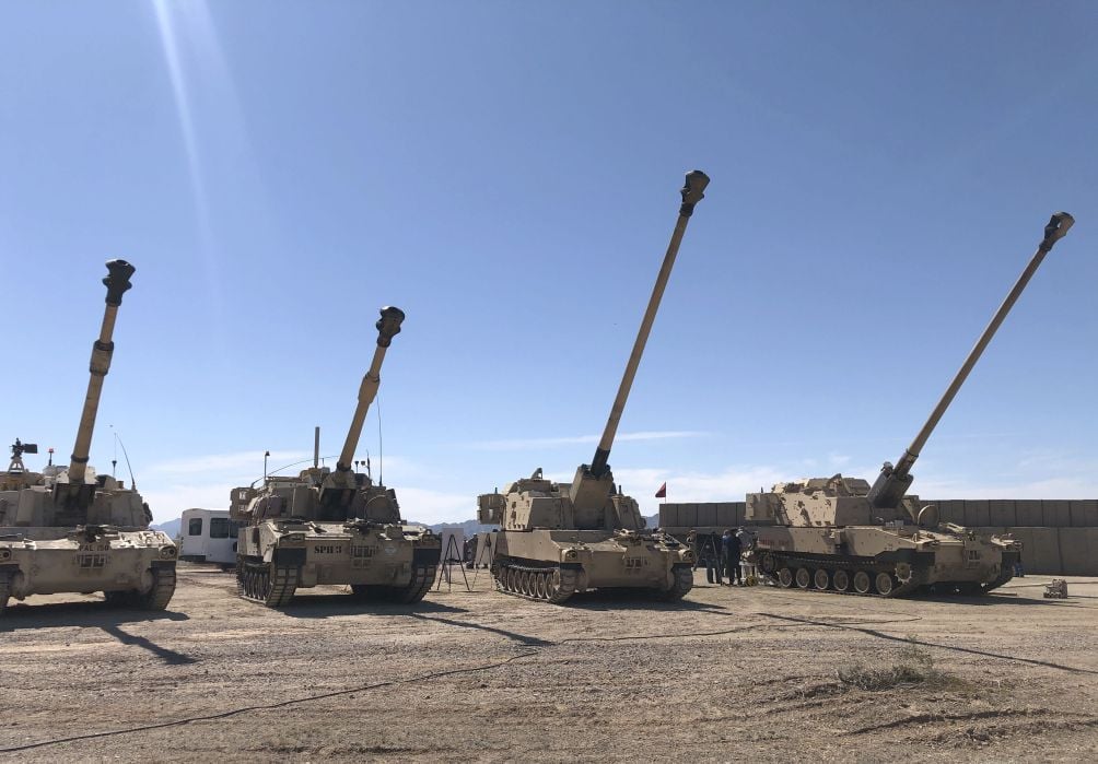 In March the US Army hosted a demo of its XM1299 prototype zero (far right) – a modified self-propelled howitzer outfitted with a 58-calibre, 30-ft gun tube – at Yuma Proving Ground, Arizona. The service is expected to use the prototype during the ongoing Project Convergence event.  (Ashley Roque/Janes)
