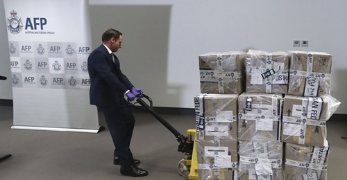 A representative from the Victorian Joint Organised Crime Taskforce wheels in 300 kg of cocaine at the Australian Federal Police Melbourne office on 30 November 2017 in Melbourne, Australia. Australian authorities made a record maritime seizure of coca...