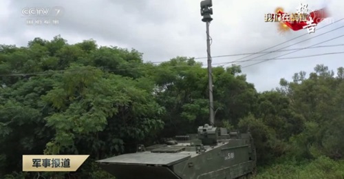 The PLAGF's new amphibious reconnaissance vehicle has been fitted with a telescopic mast mounting what appear to be an electro-optical and infrared (EO/IR) system, a laser-range finder, and an X-band radar.