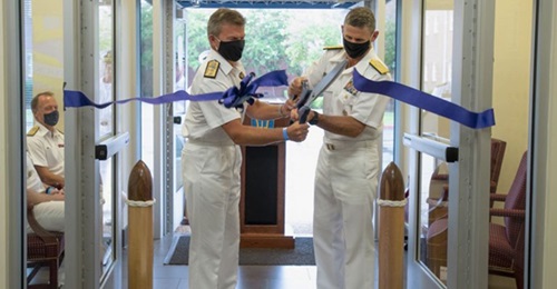 JFC Atlantic commander US Vice Admiral Andrew Lewis (right) and his deputy, UK Royal Navy Rear Admiral Andrew Betton cutting the ribbon during the new command's IOC ceremony.