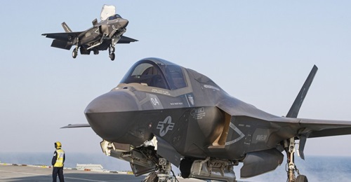A US F-35B about to be joined by a UK aircraft on the deck of HMS 
        
        . Besides these two nations and Italy, other potential operators have expressed interest in the 'pocket carrier' capability that the STOVL jet could afford the...