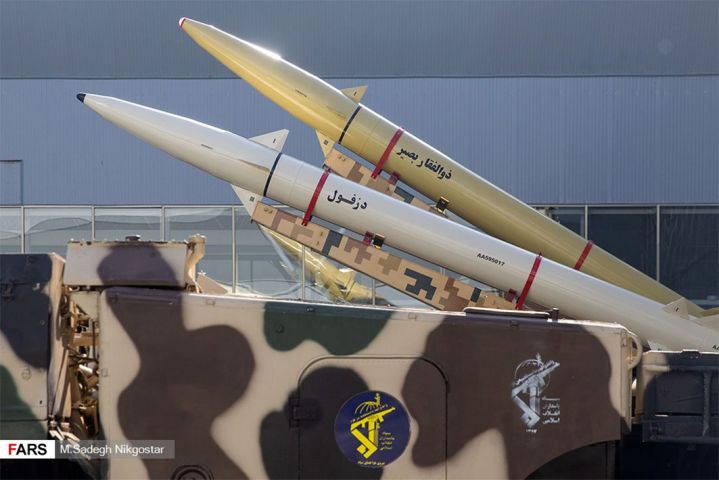 A Zolfaghar Basir anti-ship ballistic missile (rear) is seen mounted on a mobile twin-launcher alongside a Dezful missile, the longest-range variant of the Fateh-110 family.      (Fars News Agency)