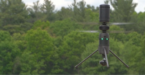 Ascent Aerosystems' Spirit cylindrical coaxial rotor small unmanned aerial system (sUAS). The aircraft is about 28 cm tall and roughly 11 cm in diameter.