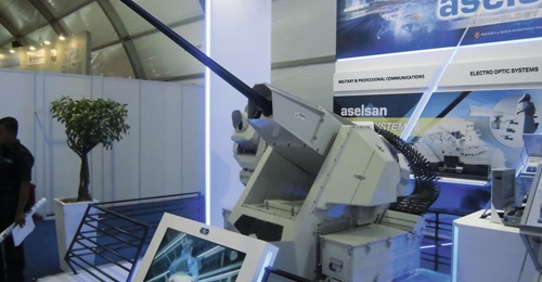 A mock-up of Aselsan's SMASH 30 mm remote-controlled naval gun system on display at LIMA 2017 in Langkawi.