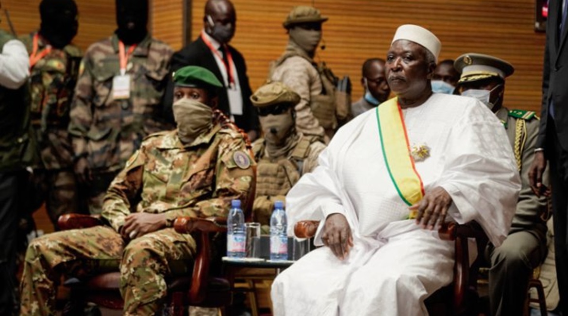 Malian transitional President Bah N'daou, right, with Malian interim vice-president Colonel Assimi Goïta, left, during an inauguration ceremony at the CICB (Centre International de Conferences de Bamako) in Bamako on 25 September 2020. A mixed civ...