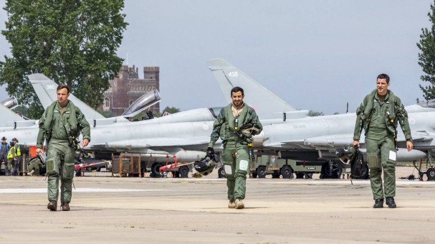 A Qatari with British pilots at RAF Coningsby. (Crown Copyright)