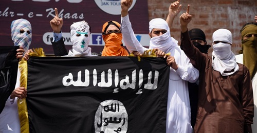Kashmiri protesters hold up an Islamic State flag in Srinagar in India's Jammu and Kashmir state on 5 June 2019. Wilayat Pakistan sources claimed that their group and Wilayat al-Hind were actively recruiting in the region.