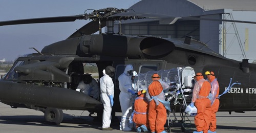 In an undated photo, a Chilean Air Force Sikorsky Black Hawk utility helicopter is used in a Covid-19 response mission.