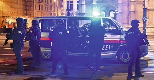 Armed police officers respond to a multiple shooting attack by a suspected Islamist extremist in the central restaurant district of Vienna, Austria, on 2 November. The attack followed a series of Islamist attacks in France.