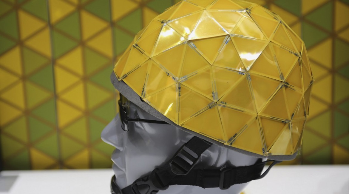 A prototype of an electrochrome helmet that switches colour depending on the environment.