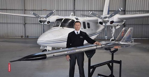 The Australian-developed Evader autonomous aerial target missile system (foreground) and the Aero Commander 500-series aircraft used to test-fire it.