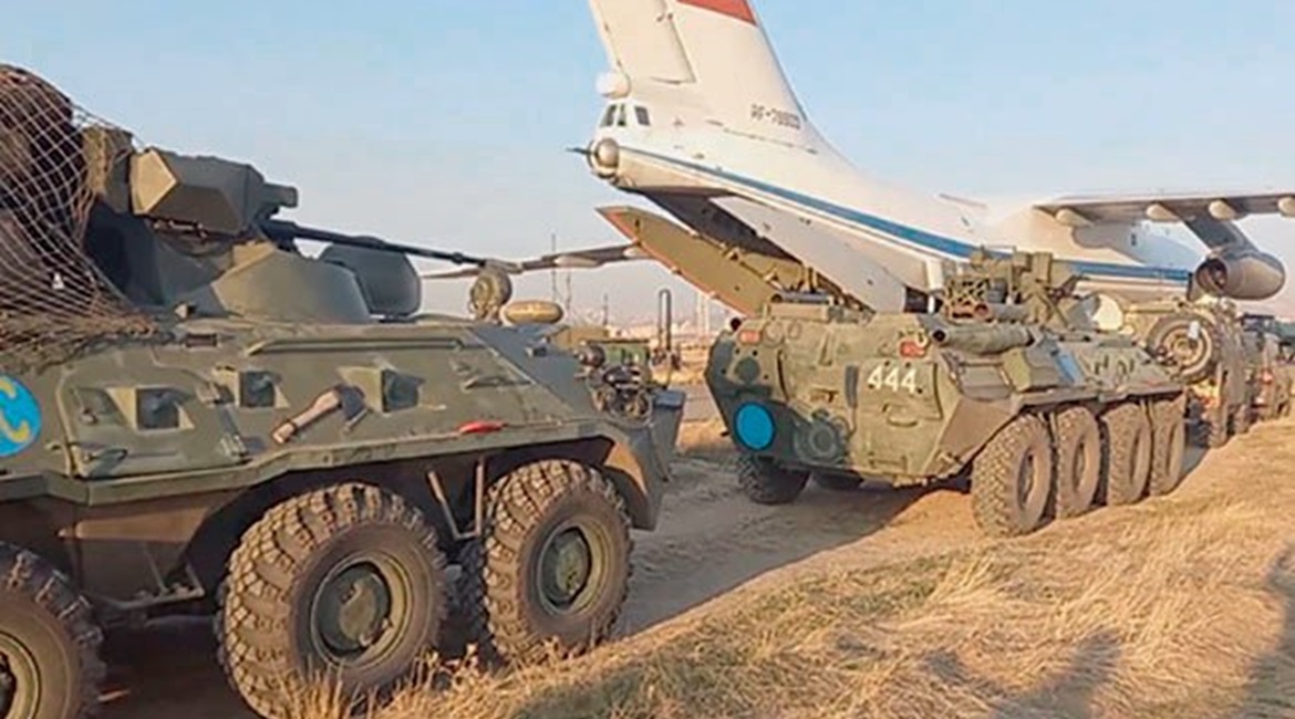 Vehicles from Russia's 15th Independent Motorised Rifle (Peacekeeping) Brigade unloading from Il-76 transport aircraft after arriving in Armenia.