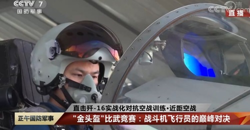 A still from CCTV 7 footage released on 11 November showing the pilot of a PLAAF J-16 fighter aircraft wearing what appears to be a new helmet featuring an HMDS.