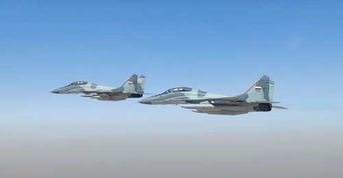 Two MiG-29M2 multirole fighters, one carrying a Kh-31 supersonic air-to-surface missile in a still from the Exercise 'Eagles of the Nile 1' video.