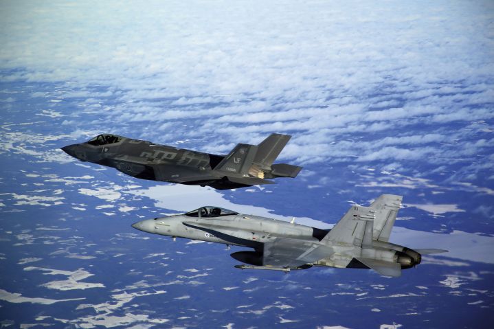 A Lockheed Martin F-35 with a Finnish Air Force Boeing F/A-18 Hornet at the HX Challenge evaluation event in Finland in February. (Finnish Air Force)