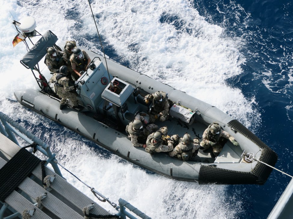 
        A boarding team from the German frigate 
        Hamburg
         arrives to inspect the merchant vessel 
        Royal Diamond 7
        , which was carrying jet fuel from the United Arab Emirates to the Libyan city of Benghazi, on 10 September 2020. The operation was part of ‘EUNAVFOR MED IRINI’, launched in May. 
       (EUNAVFOR MED IRINI/Anadolu Agency via Getty Images)