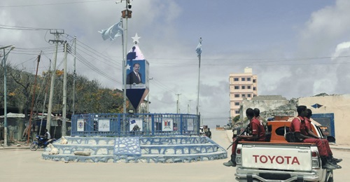 Banners of Somalian President Mohamed Abdullahi Mohamed, widely known as Farmaajo, overlook a crossroads in Mogadishu, Somalia, on 3 August 2020. The violence and instability that started with Somalia's civil war in 1991 continue to characterise the co...