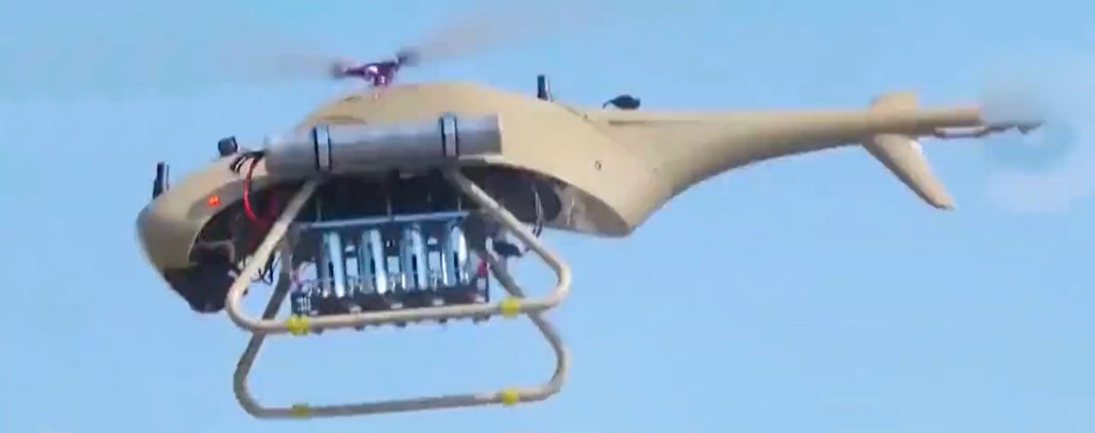 A Ziyan Blowfish A2 VTOL UAV in flight fitted with an underslung rack for four mortar bombs. (CCTV)