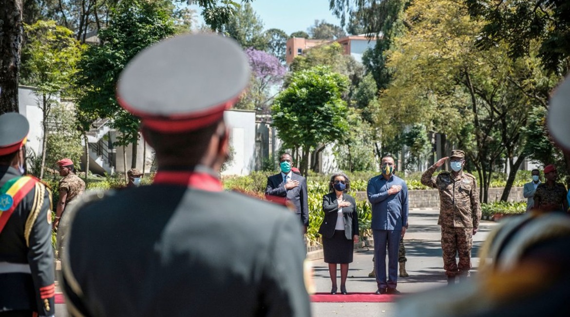 Sahle-Work Zewde (centre L), President of Ethiopia, stands next to Abiy Ahmed (centre R), Prime Minister of Ethiopia, and General Birhanu Jula (R), Chief of General Staff, during an event to honour the national defence forces in the capital Addis Ababa...