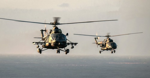 Two PLAGF Mi-171-series multirole helicopters during a training exercise on 11 November. One of the rotorcraft (foreground, left) is equipped with what appear to be ECM pods under its stub wings.