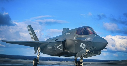 A USMC F-35B assigned to Marine Fighter Attack Squadron (VMFA) 211 taxis aboard HMS 
        
         at sea on 10 October 2020. The F-35B met its mission capability target in one year during FY 2011-19.