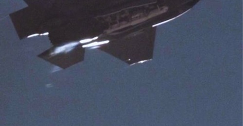 An F-35A Lightning II opens its bomb bay doors and drops a mock B61-12 at Sandia National Laboratories' Tonopah Test Range earlier this year.